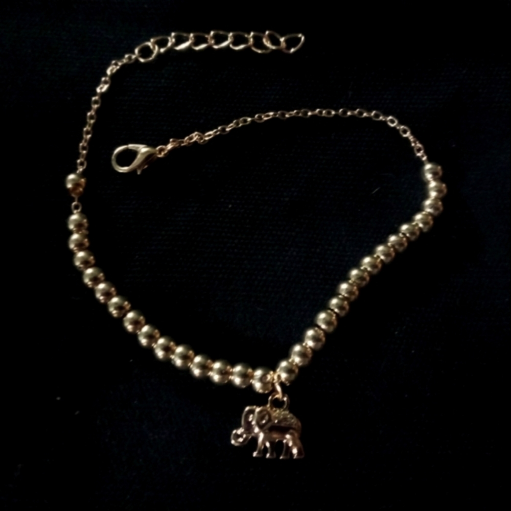 Gold "elephant" anklet